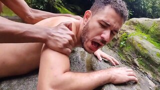 Gifted Black Man Fucks Amateur Partner at Waterfall in Hot InterracialGay Fetish Scene
