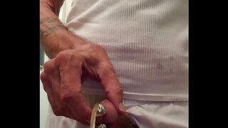 Amateur Gay Guy Enjoying Quick Pee Through Small PA Plug