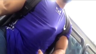 Muscled Hunk Flexes Huge Cock On The Bus For All To See